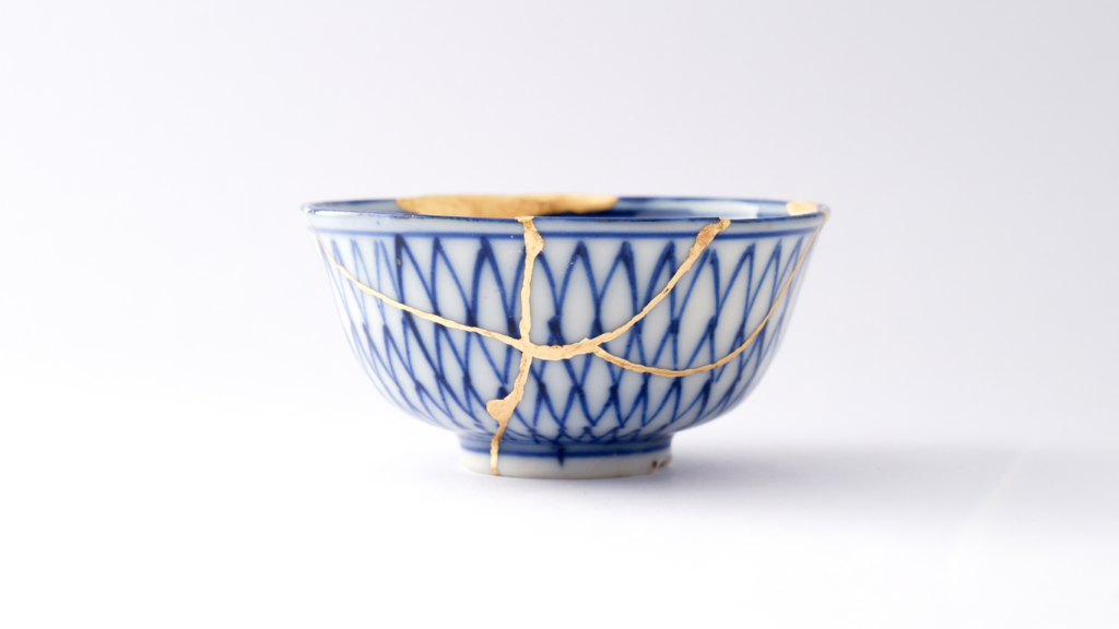 Cup fixed with kintsugi, cracks filled with gold